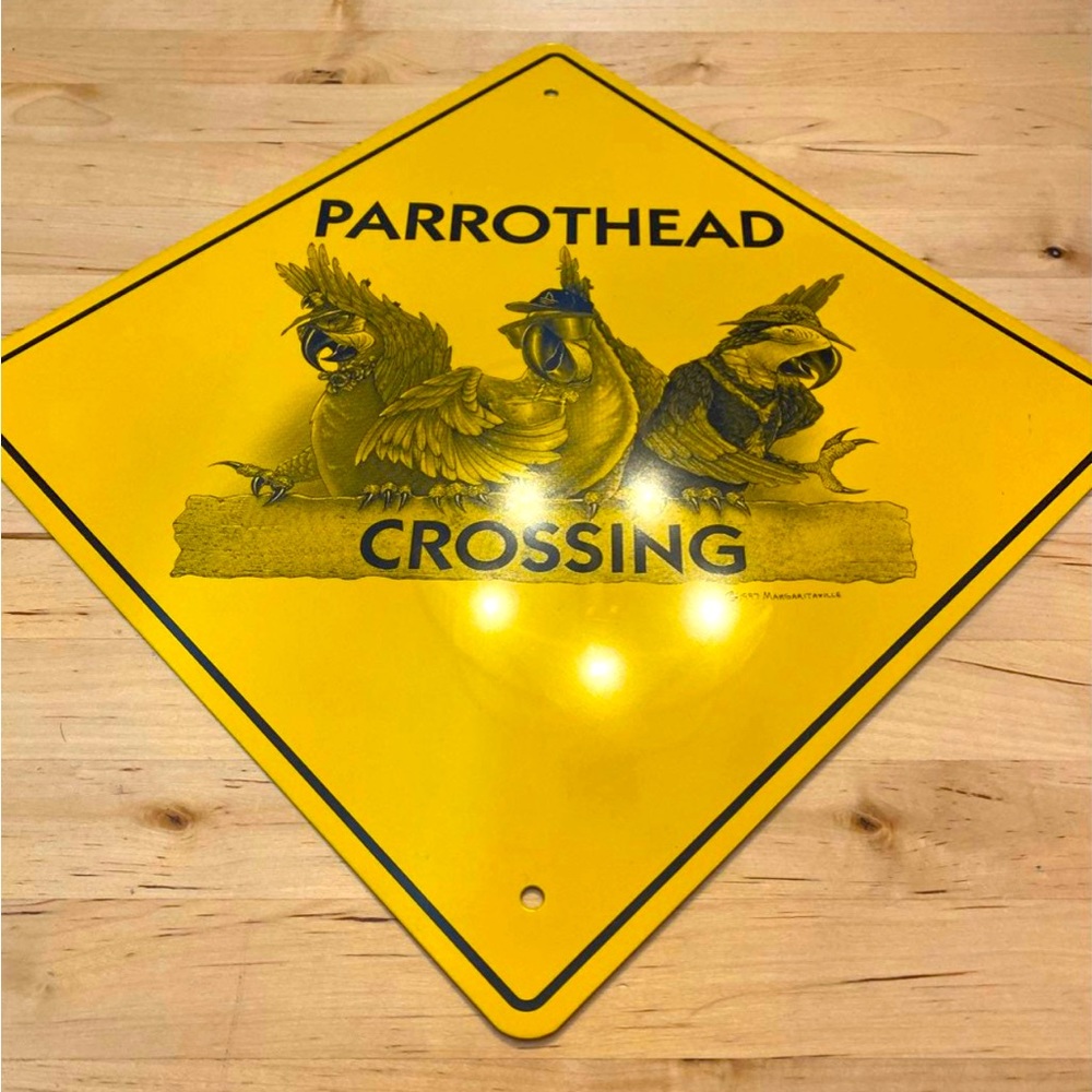 Metal parrot head sign